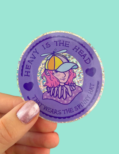 Heavy Is The Head That Wears The Spinny Hat Glitter Holographic Sticker