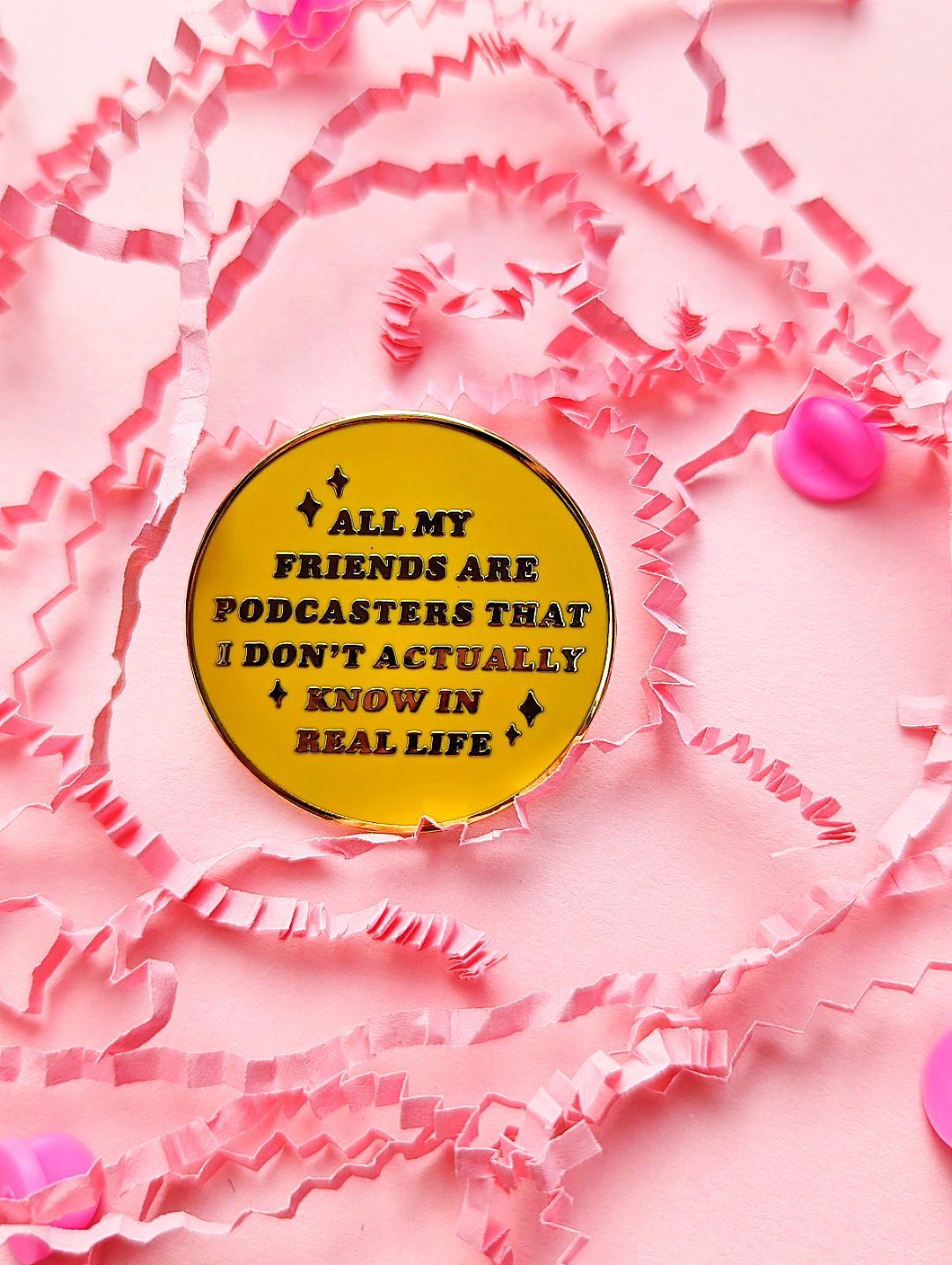 Cute Yellow Enamel Pin that says "All My Friends Are Podcasters That I Don't Actually Know In Real Life" on a pink background | Ideal for the Chronically Online