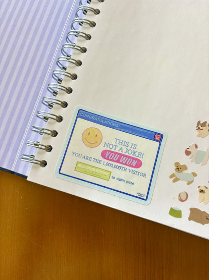 sticker inspired by old pop up scam on a page of the Coffee Table Sticker Book by Meredith Hoagie