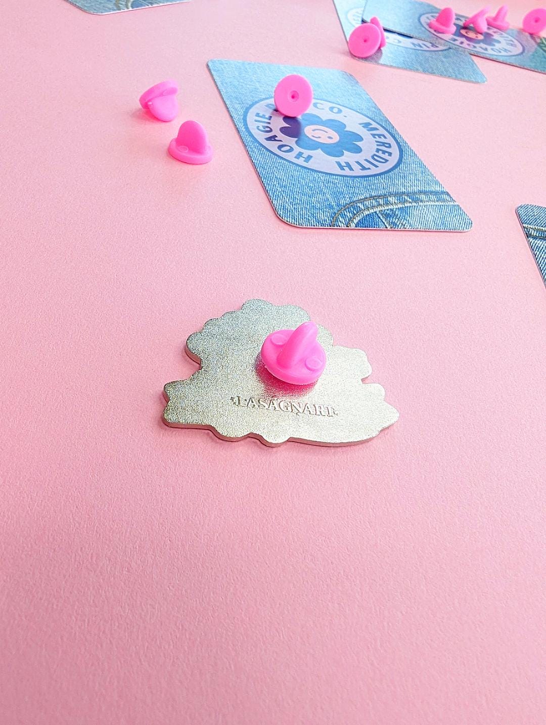 secured the bag pokemon enamel pin back with pink rubber pin backing