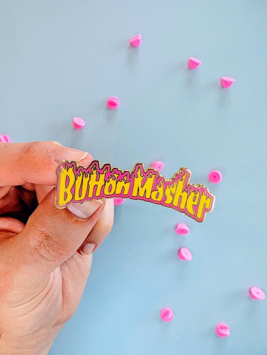 button masher gaming enamel pin, scale