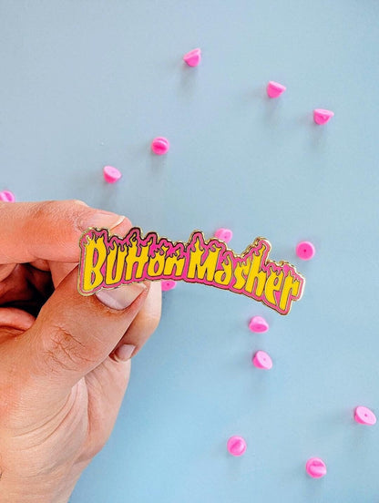 button masher gaming enamel pin, scale